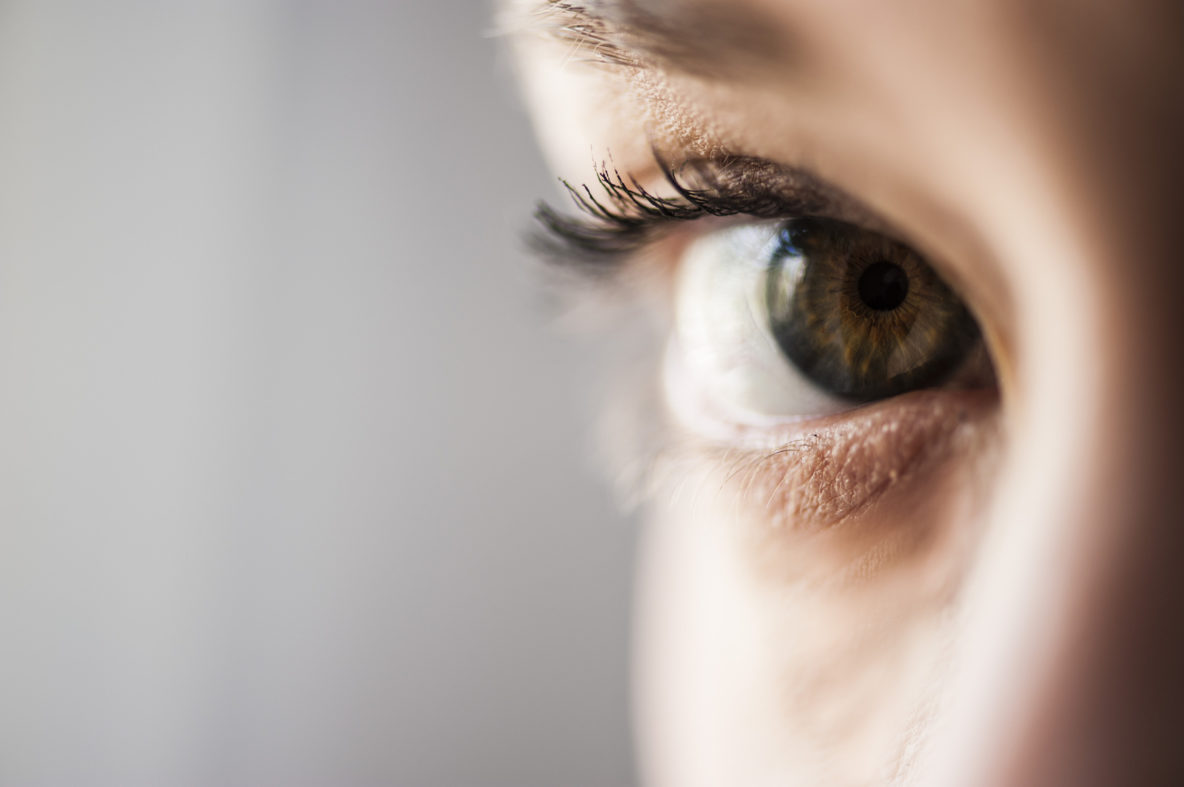 close up photo of woman's eye